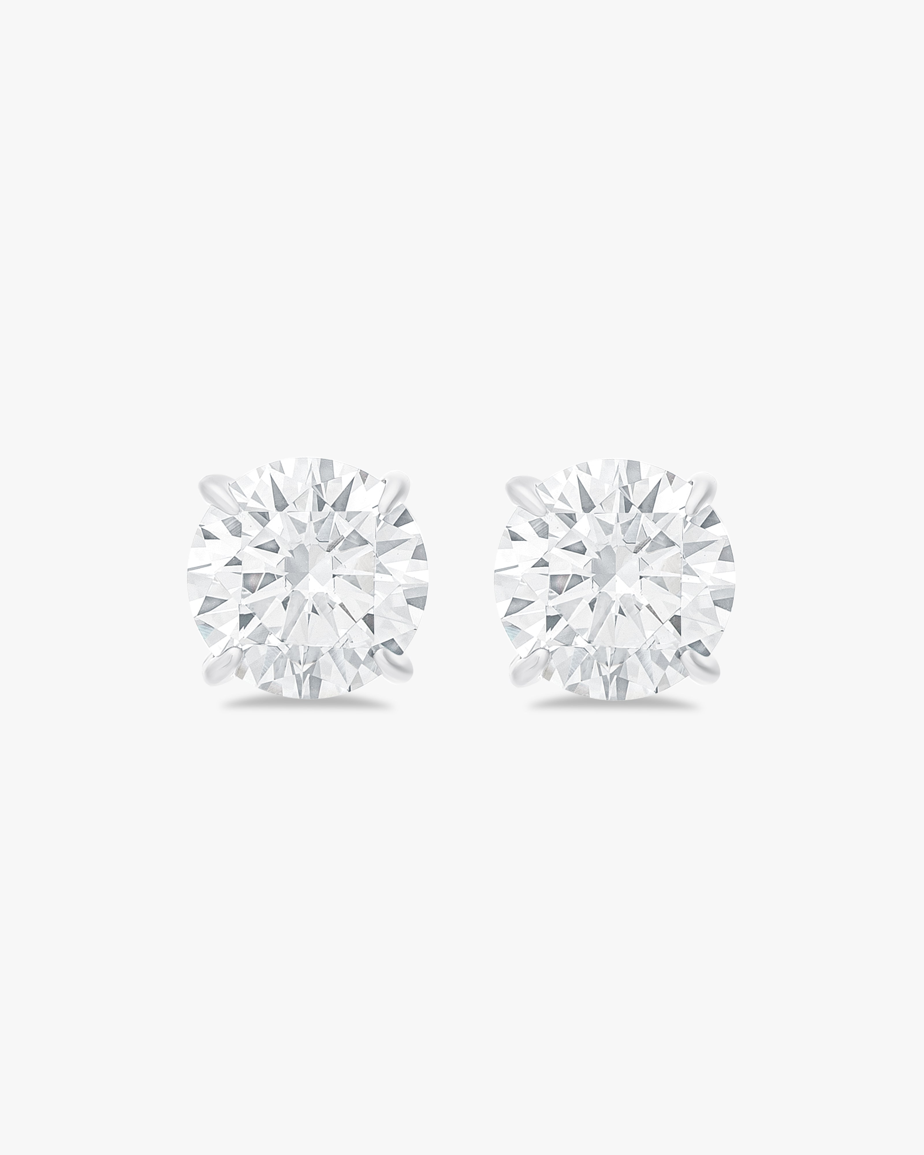 Earrings with round cut stones