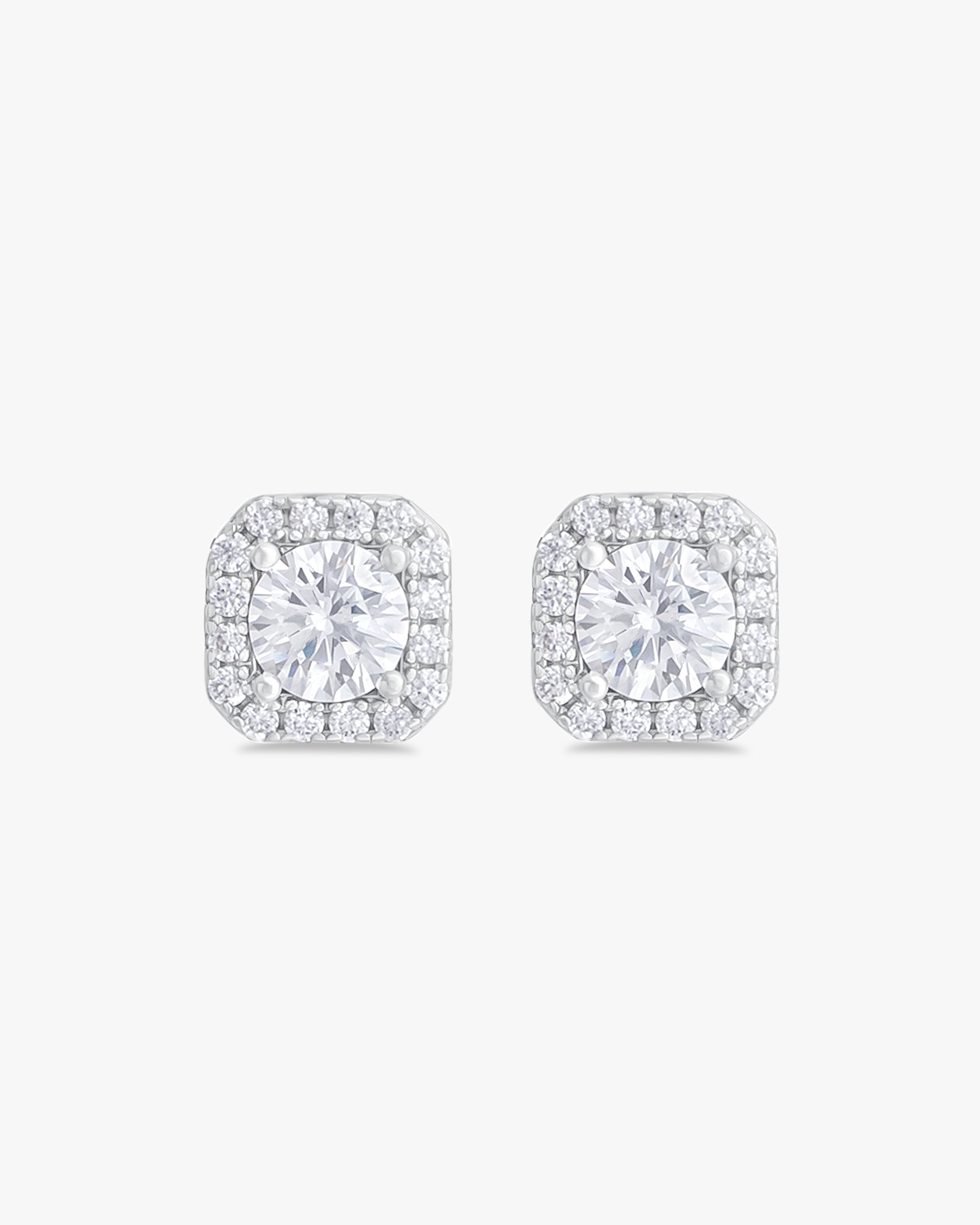 Earrings with round cut stones in halo setting
