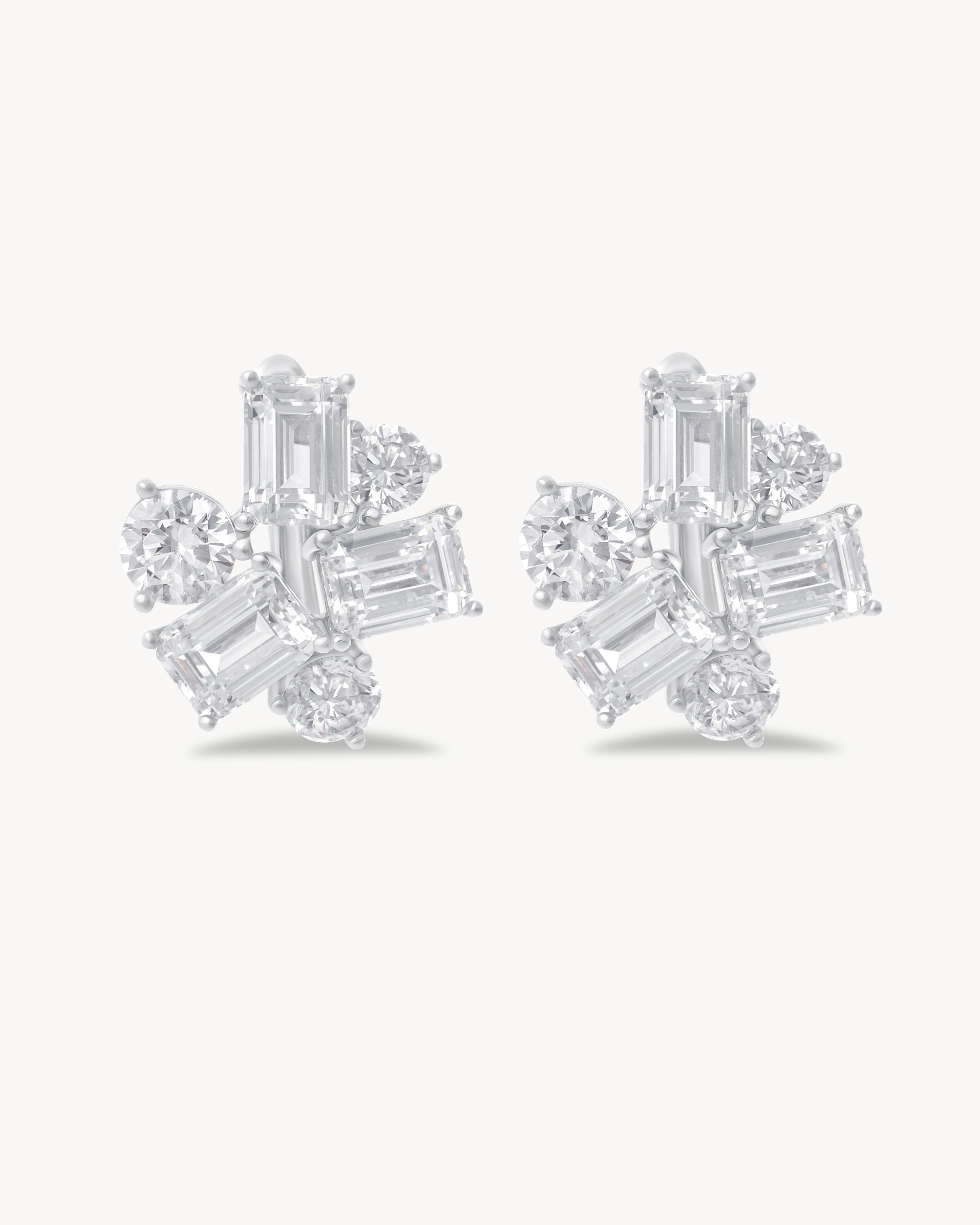 Earrings with baguette and round cut stones