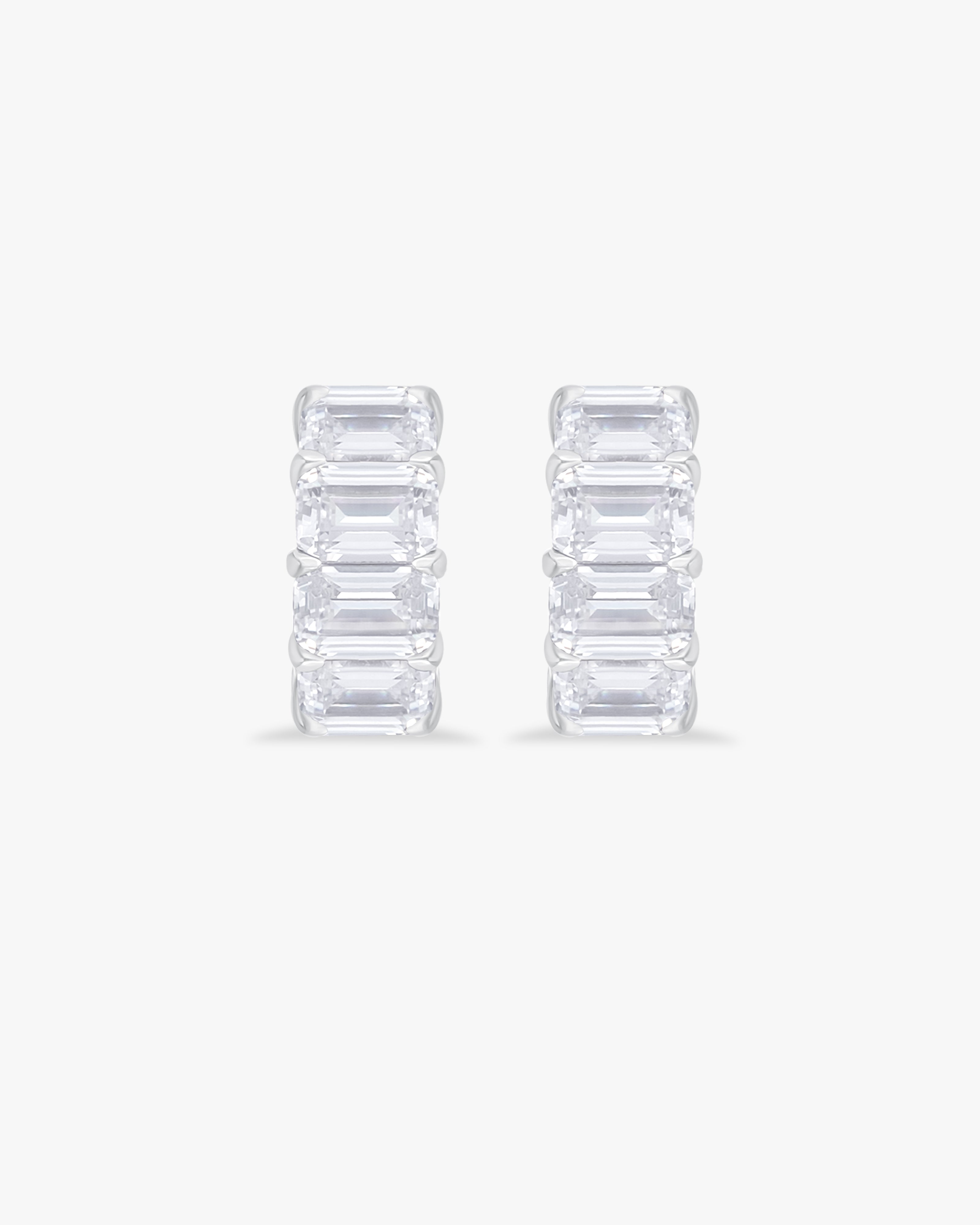 Hoop earrings with emerald cut stone