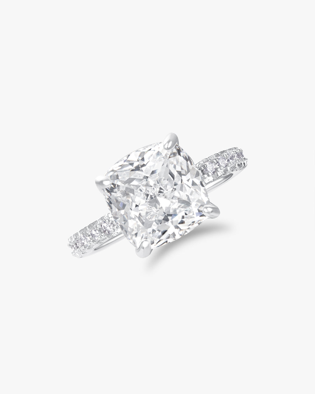 Cushion cut solitaire ring with pavé band