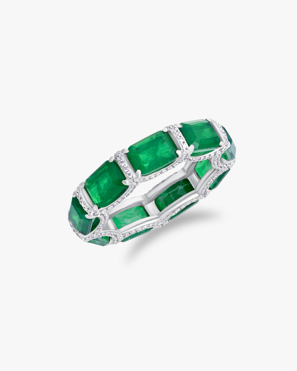 Ring with emerald cut green stones