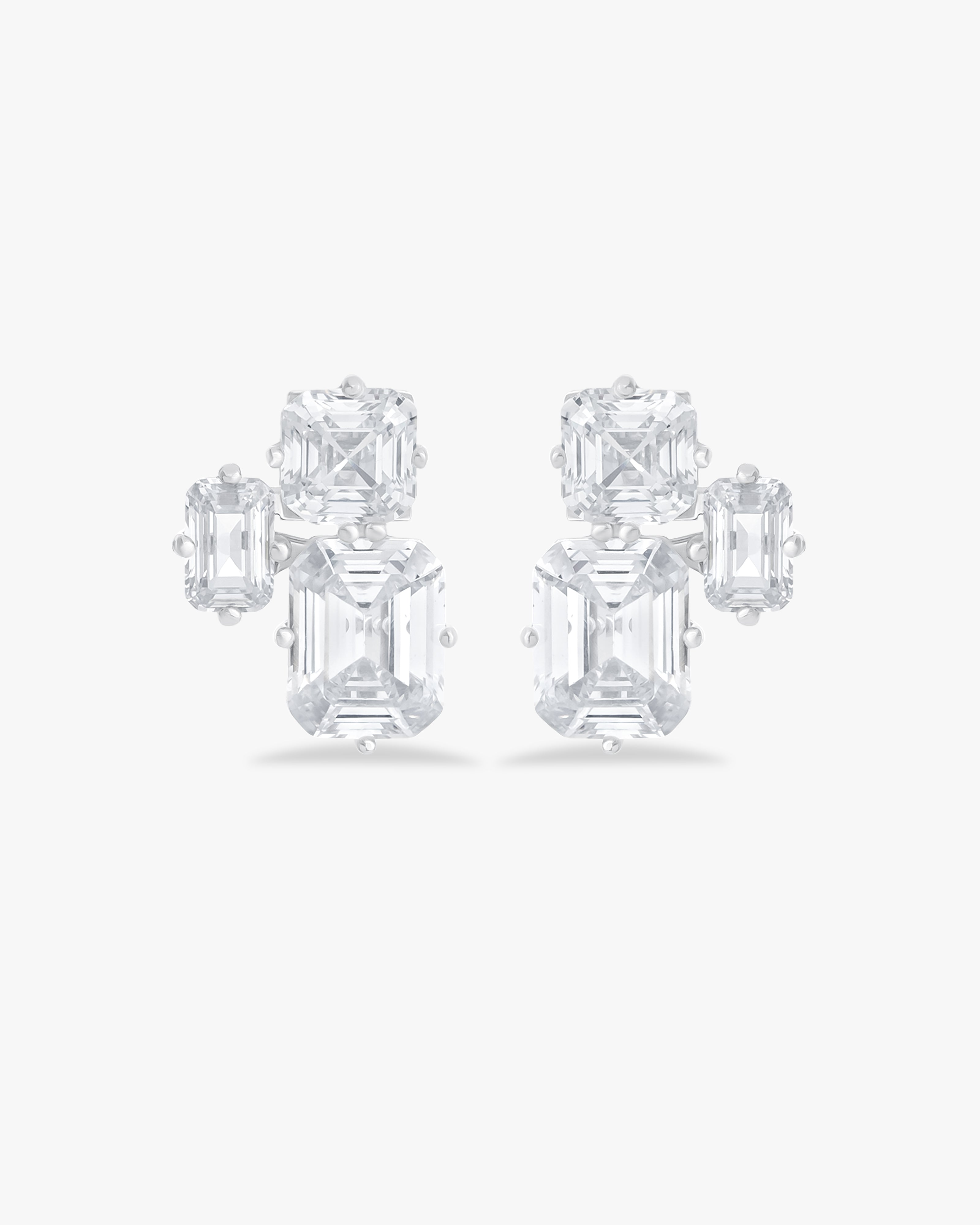 Earrings with emerald and asscher cut stones