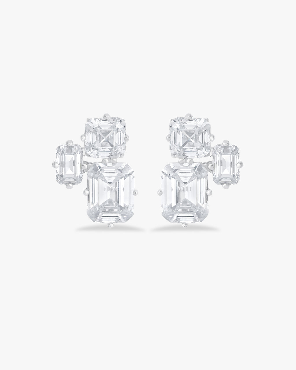 Earrings with emerald and asscher cut stones