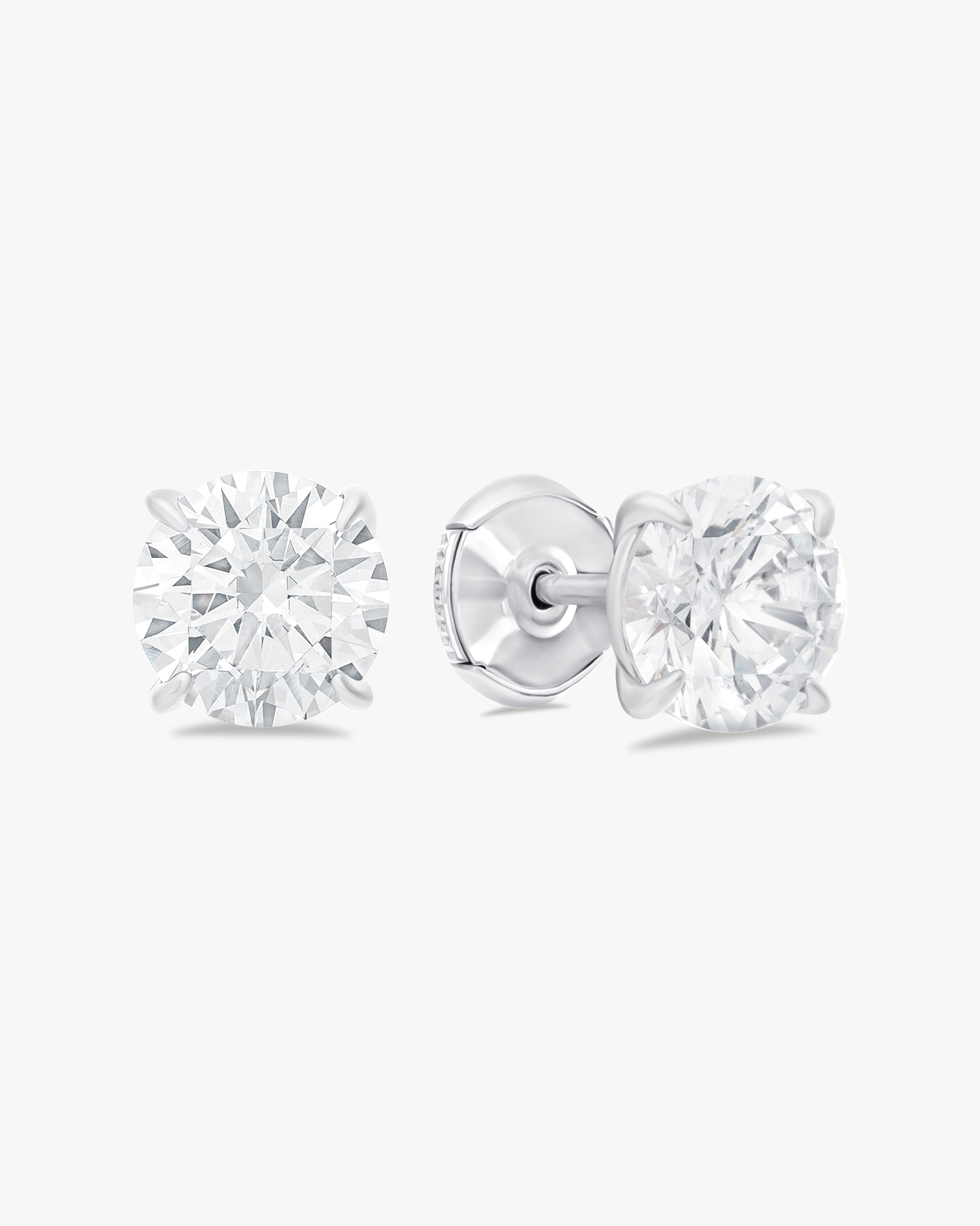 Earrings with round cut stones