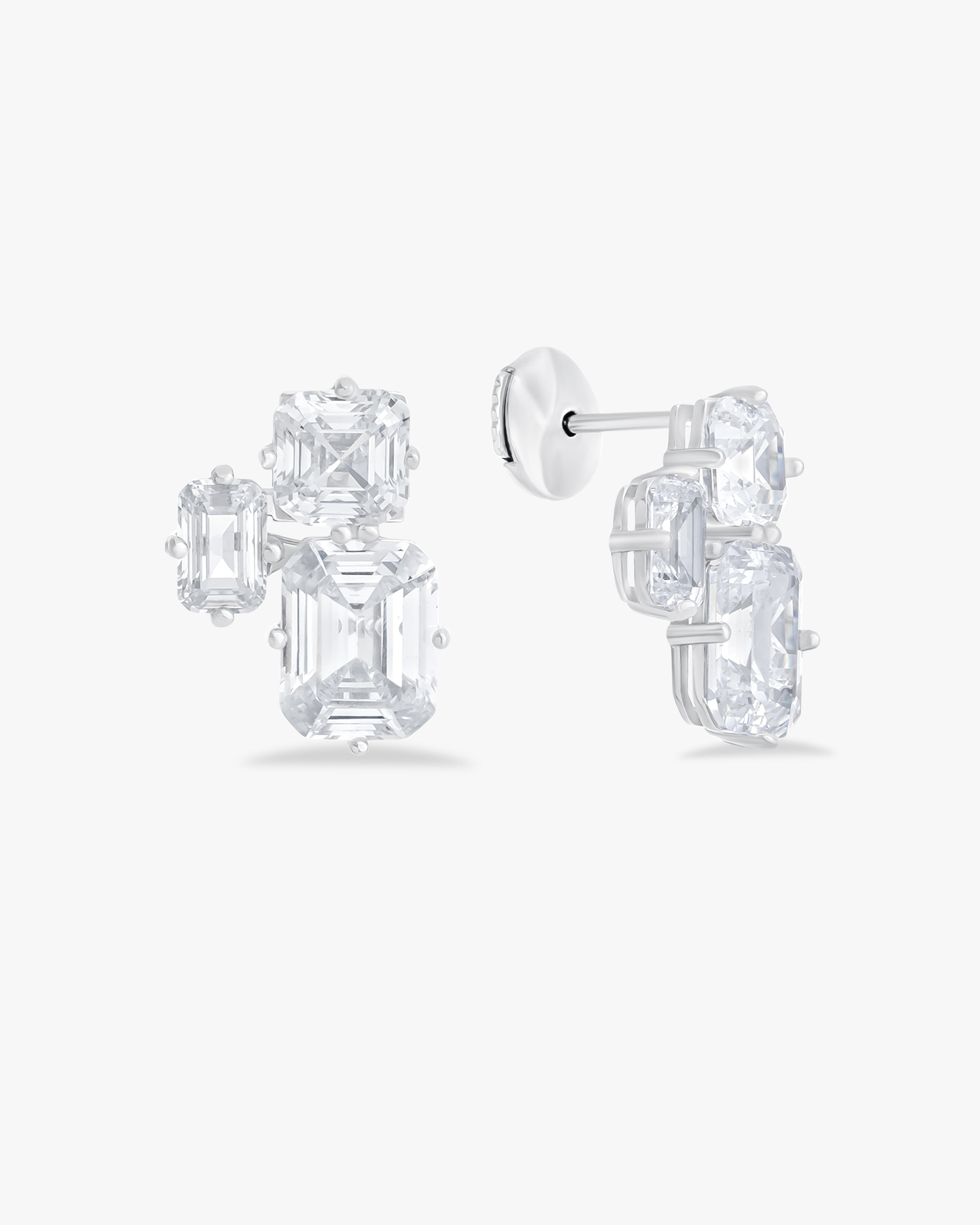 Earrings with emerald and asscher cut stones