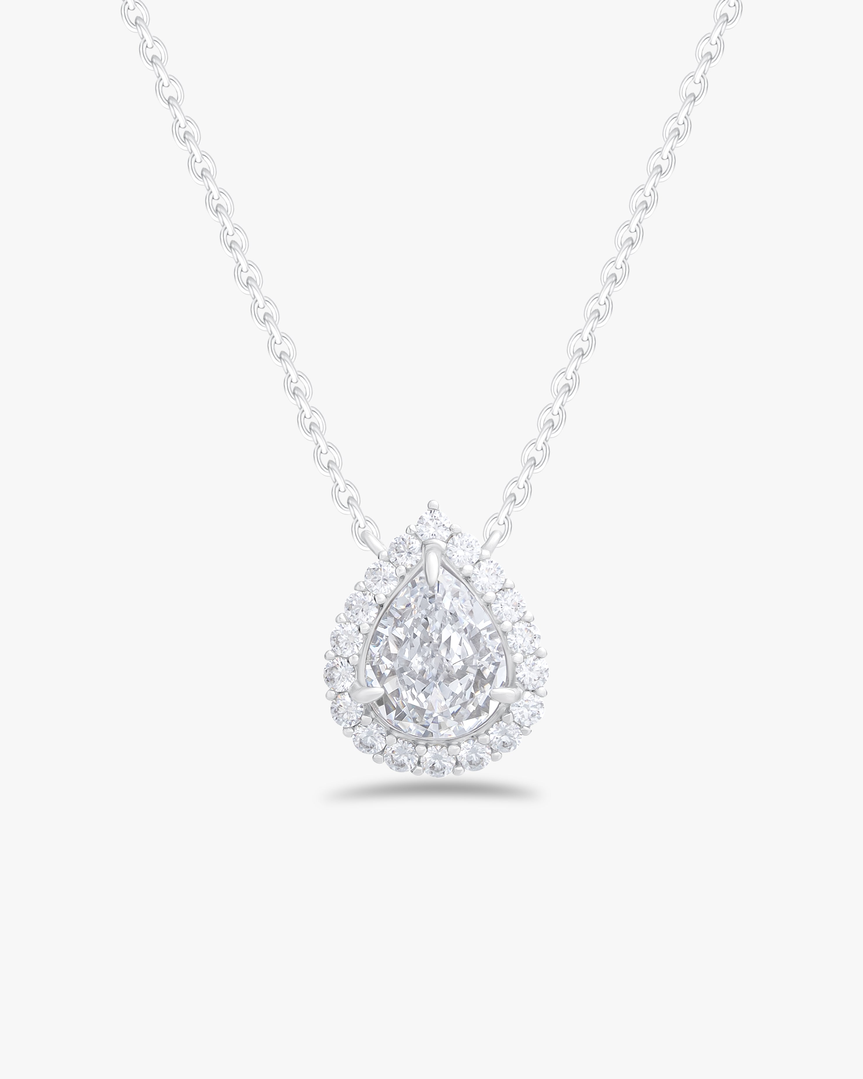 Pendant with pear cut stone and halo