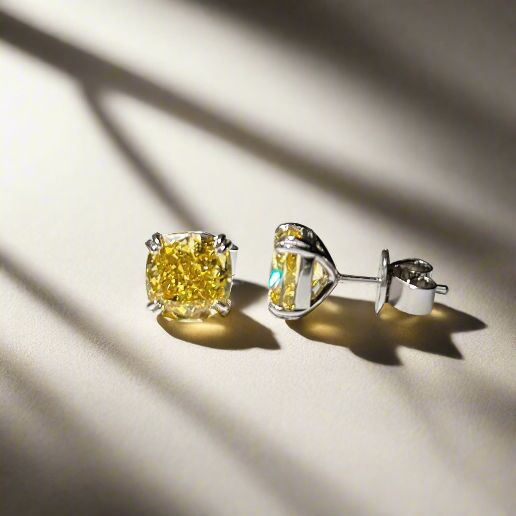 Earrings with cushion cut yellow stones