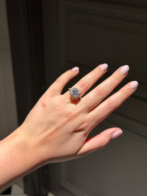 Ring with cushion cut white stone