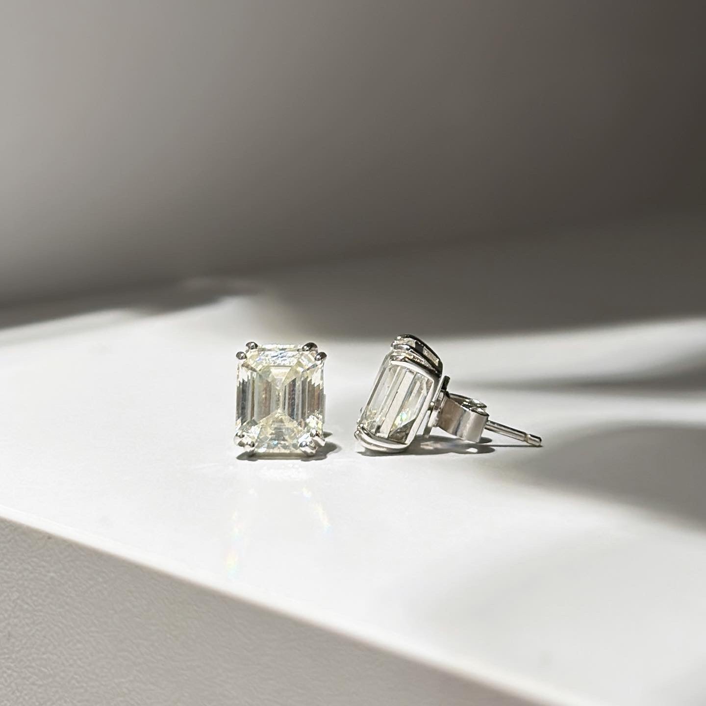 Earrings with emerald cut stones