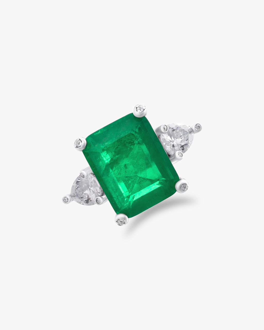 Ring with emerald green center stone and pear cut accents