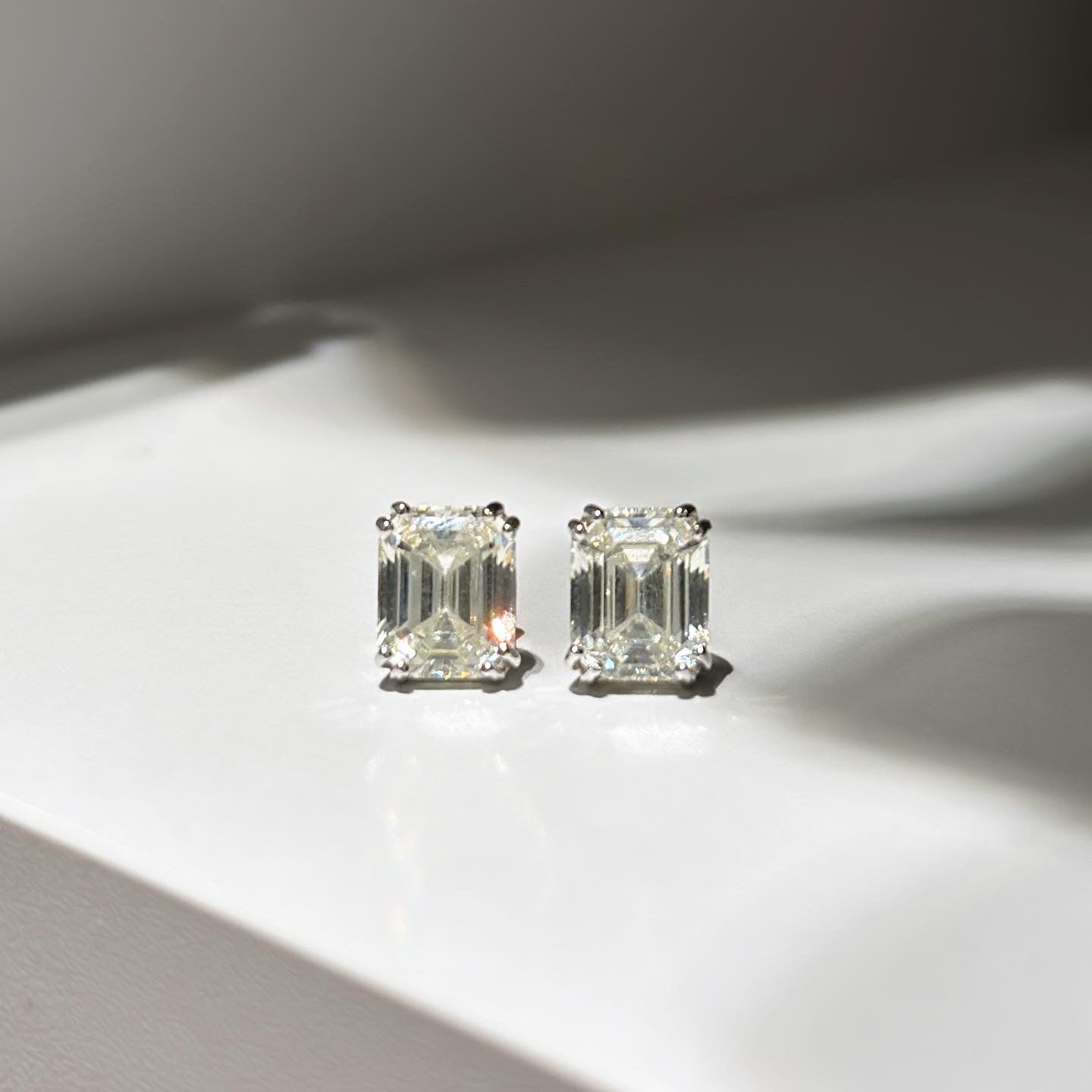 Earrings with emerald cut stones