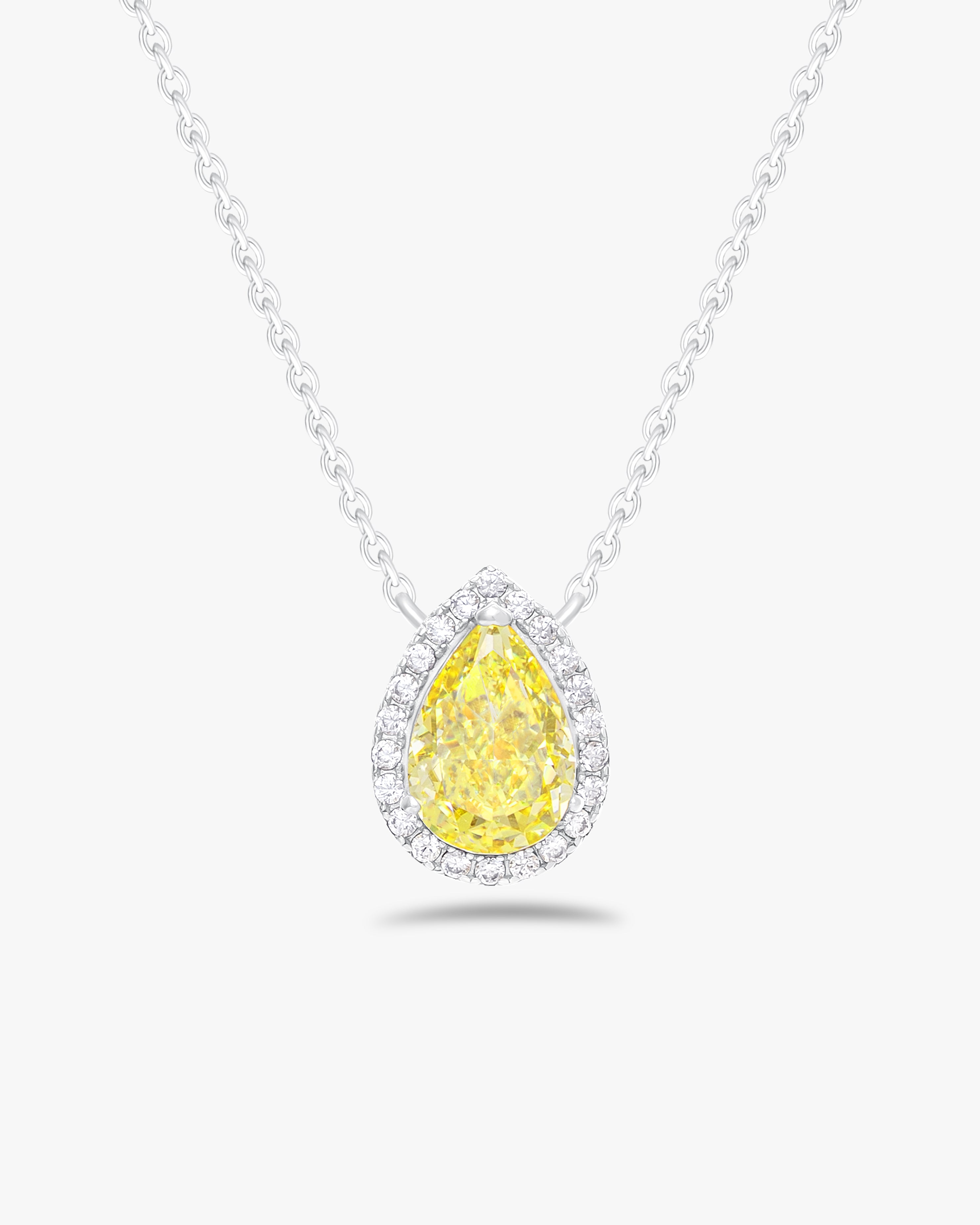 Pendant with pear cut fancy yellow stone and halo