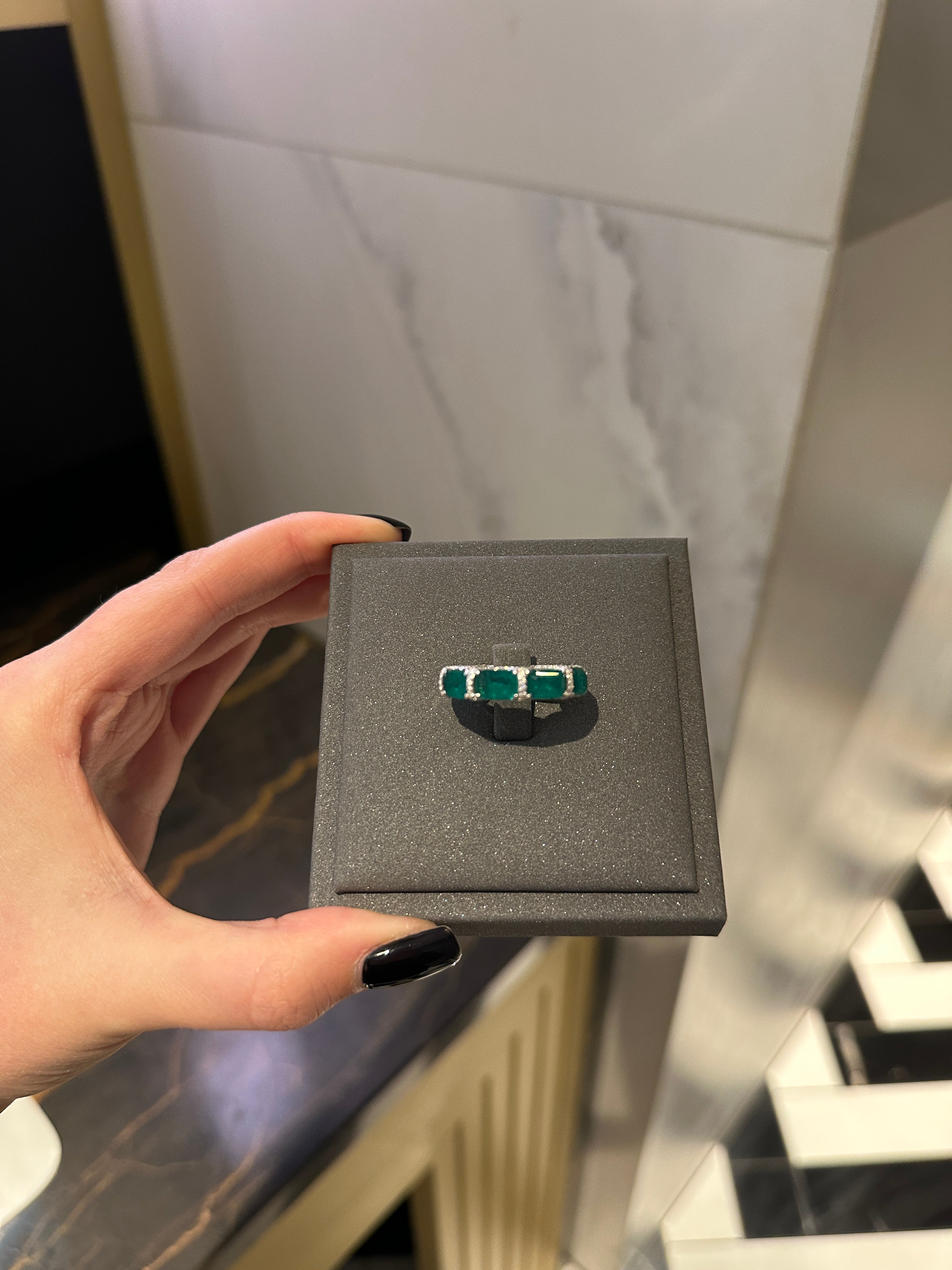 Ring with emeralds