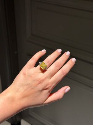 Ring with princess cut yellow stone