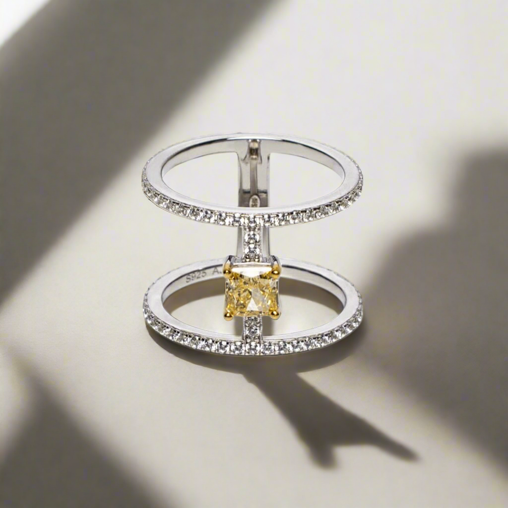 Ring with princess cut yellow stone