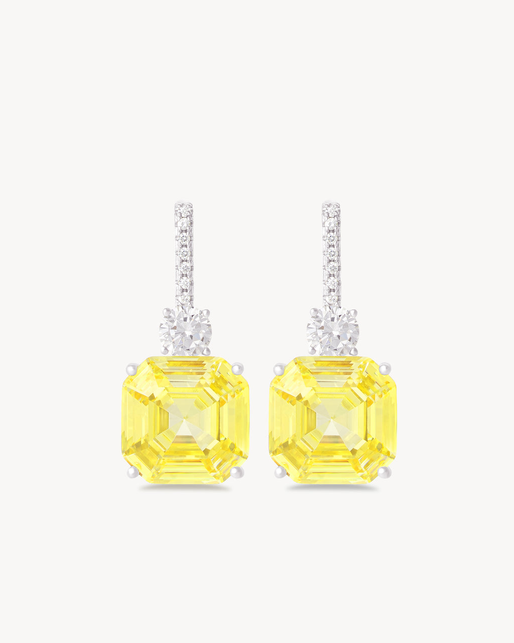 Earrings with fancy yellow asscher cut stones