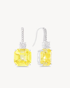 Earrings with fancy yellow asscher cut stones