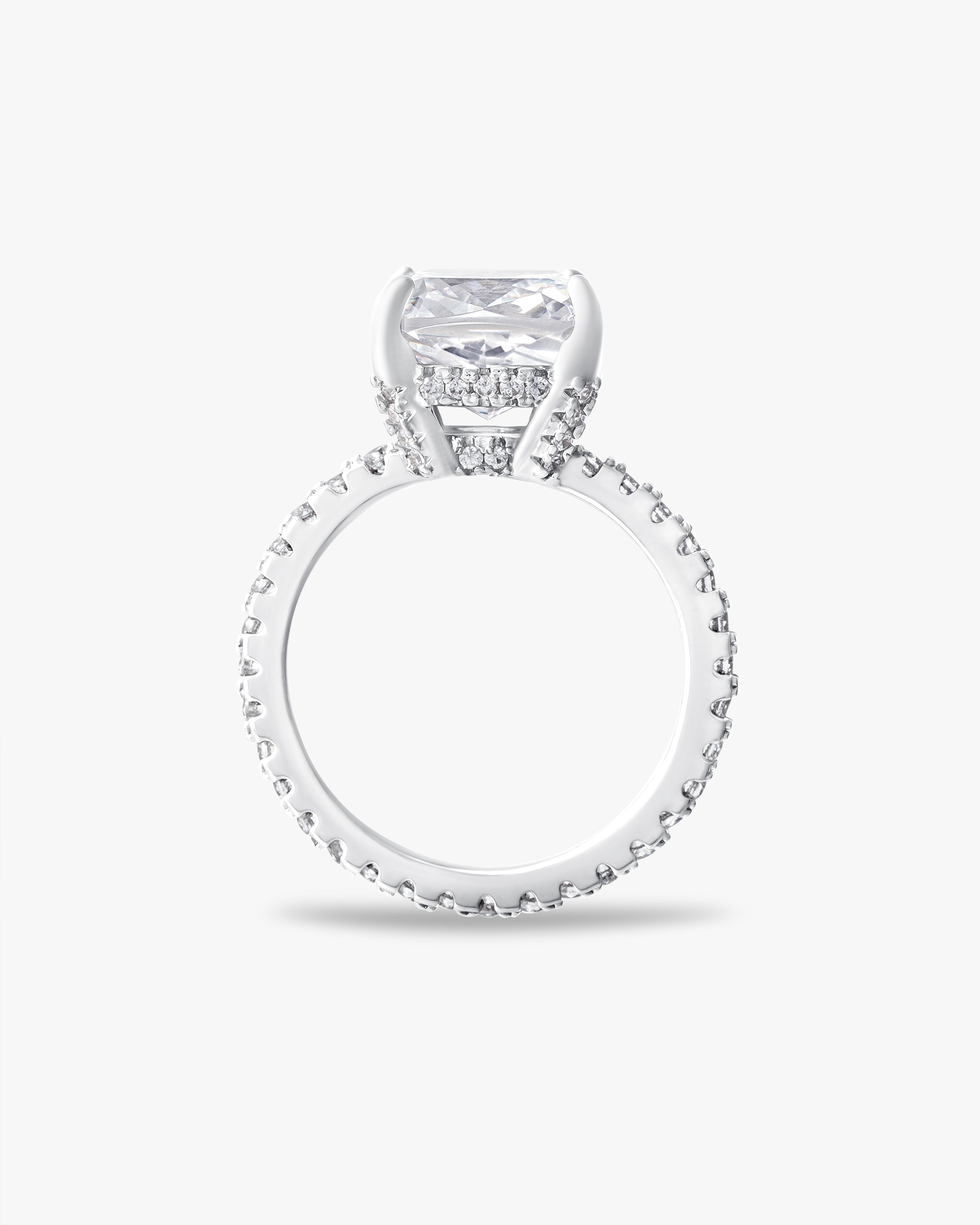 Cushion cut solitaire ring with pavé band