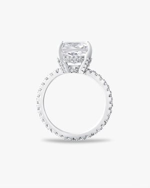 Cushion cut solitaire ring with pavé band
