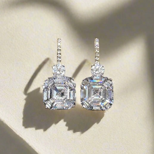 Earrings with asscher cut white stones
