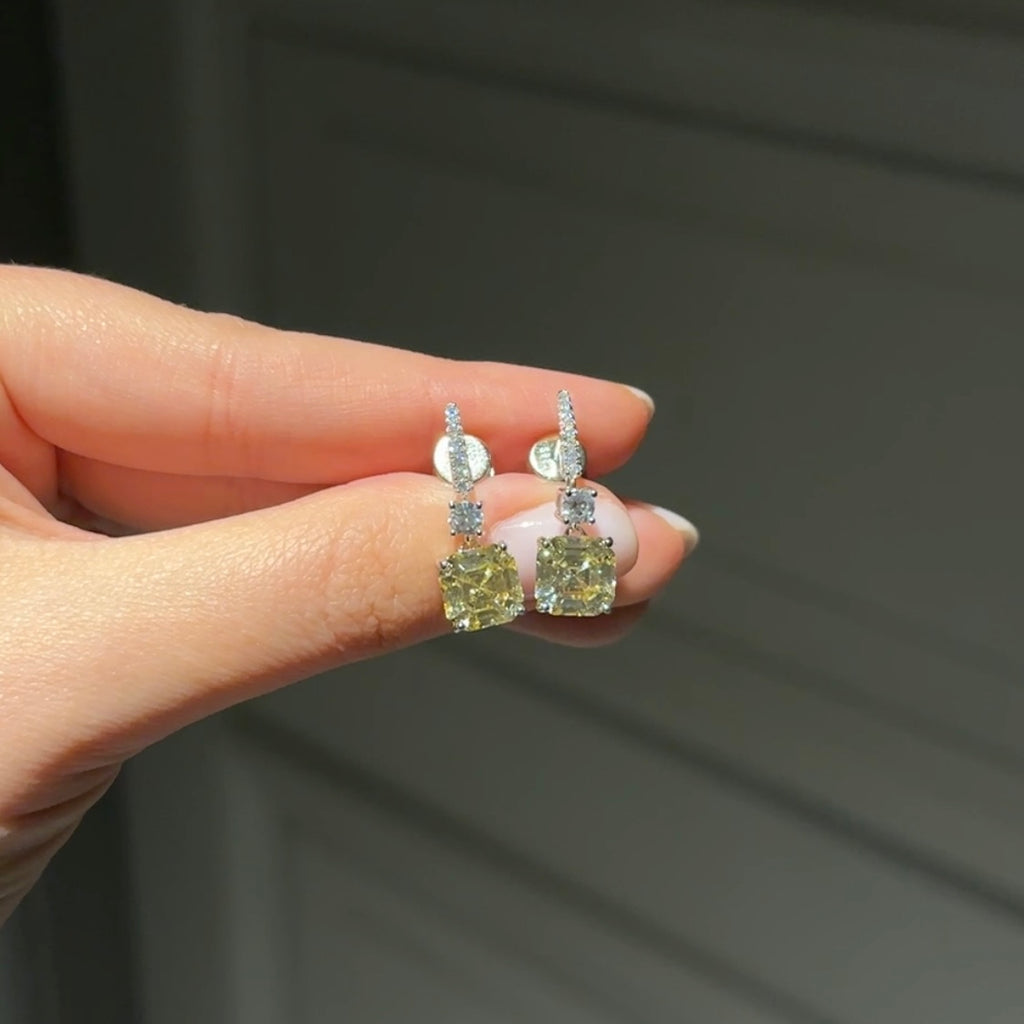 Earrings with asscher cut yellow stones