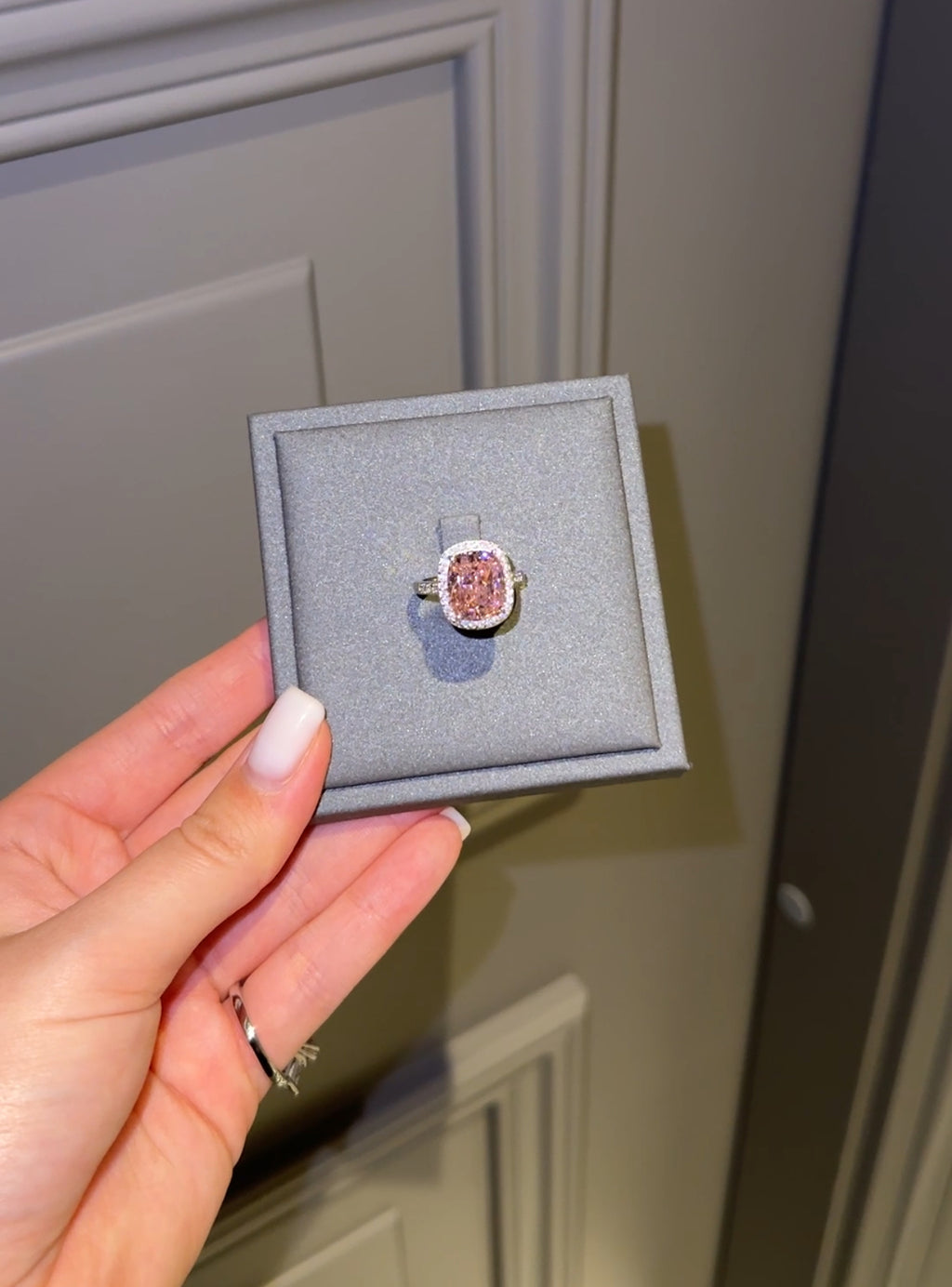 Pink cushion cut ring