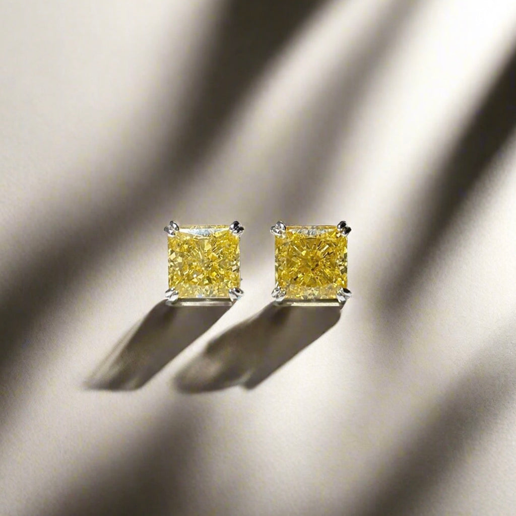 Earrings with princess cut yellow stones
