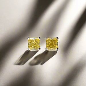 Earrings with princess cut yellow stones