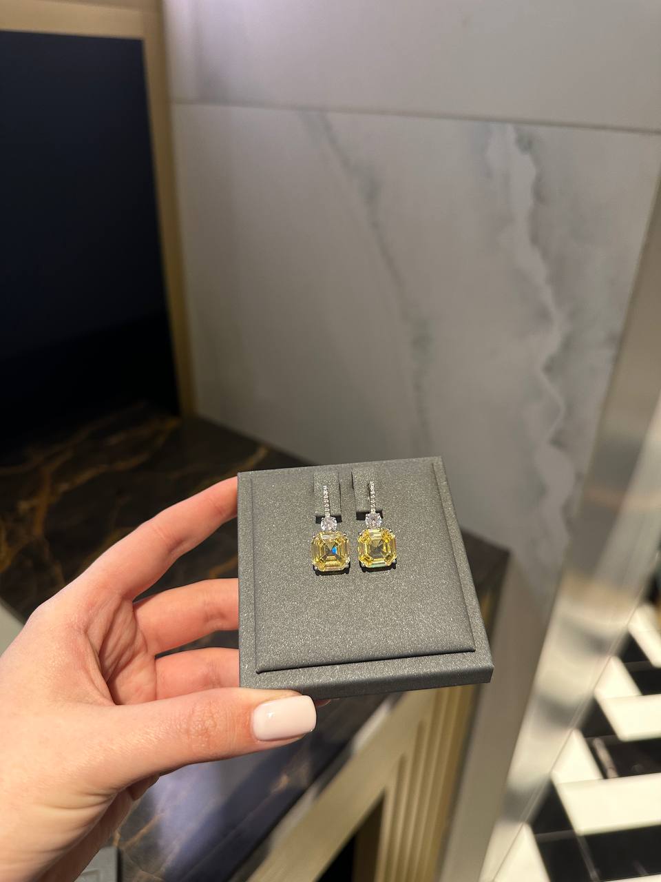 Earrings with asscher cut yellow stones