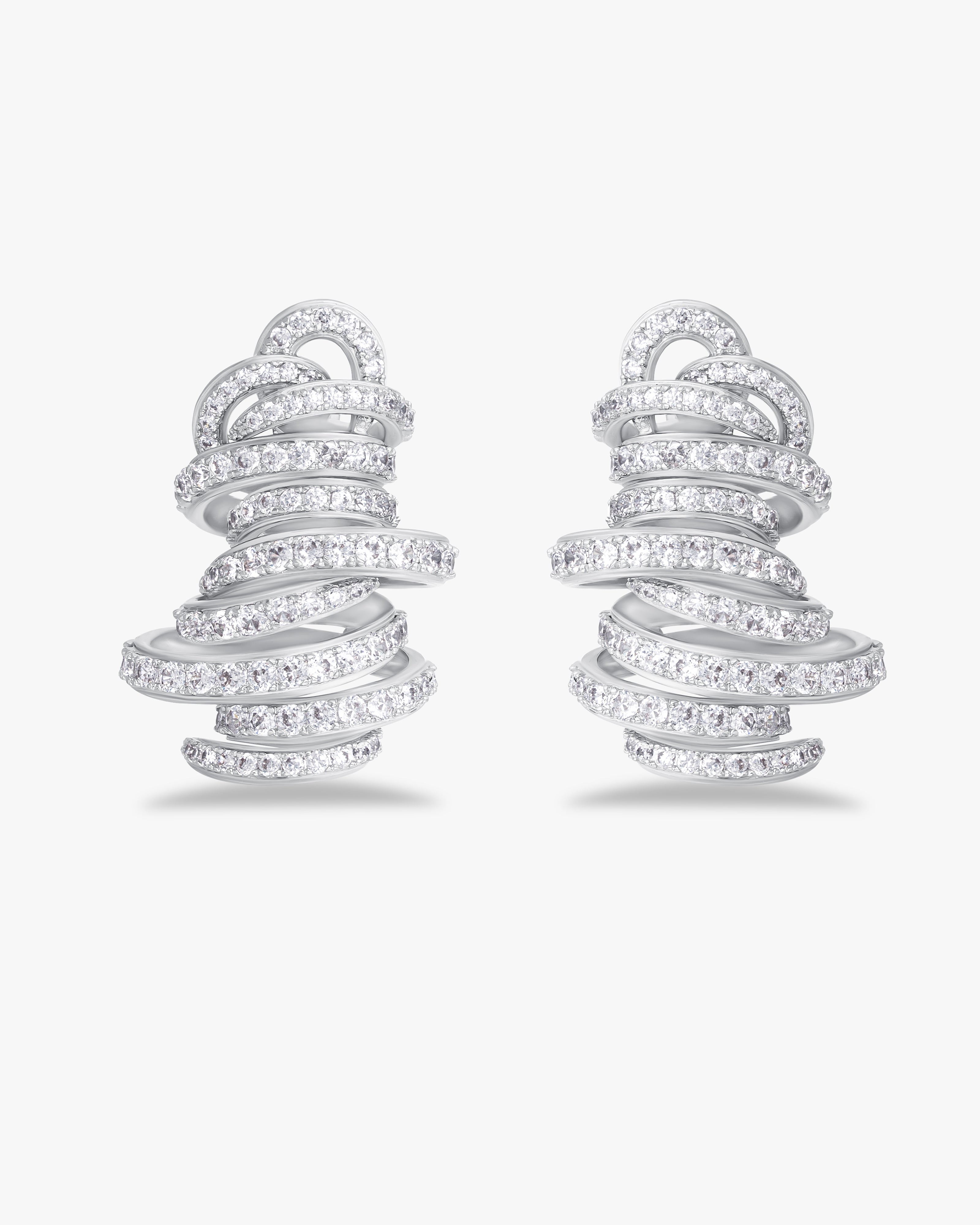 Statement earrings with pavé spiral design