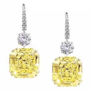 Earrings with asscher cut yellow stones