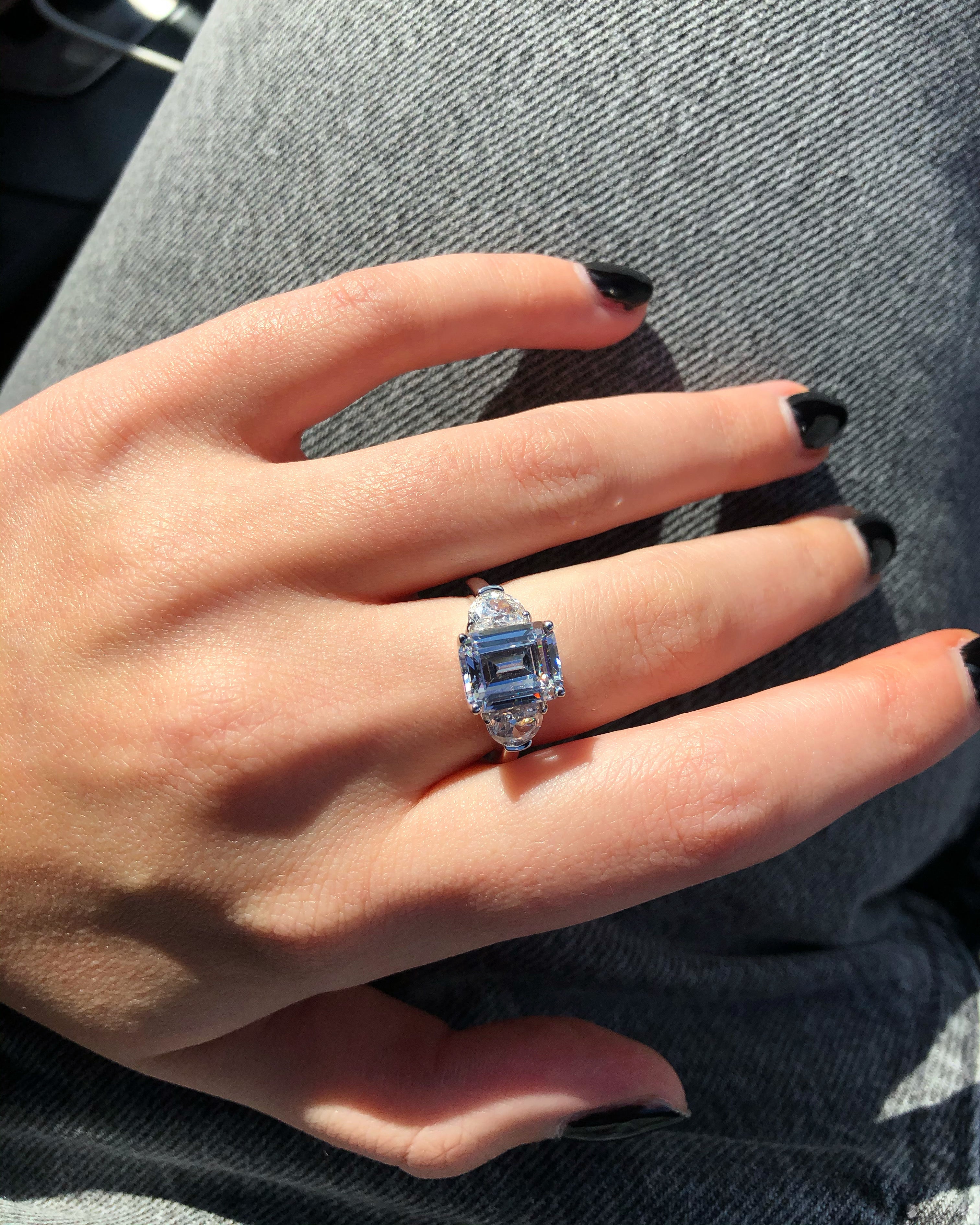 Ring with octagon cut white stone